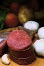 Raw beef and garlic on blur background