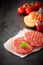 Raw Beef Hamburger Patties with Fresh Ingredients Royalty Free Stock Photo