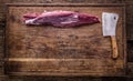 Raw beef meat. Raw beef tenderloin steak on a cutting board with rosemary pepper salt in other positions Royalty Free Stock Photo