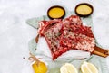 Raw beef ribs, fresh meat with mustard sauce and lemon, top view, Royalty Free Stock Photo