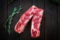 Raw beef ribs kalbi on wooden background, top view Royalty Free Stock Photo