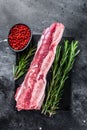 Raw beef short ribs kalbi on marble board. Black background. Top view Royalty Free Stock Photo