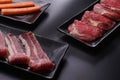 Raw beef slice for barbecue japanese style, yakiniku, meat are being cooked on stove Royalty Free Stock Photo