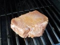 Raw beef steak on barbecue grill bars