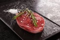 Raw meat, beef steak on black background. Royalty Free Stock Photo