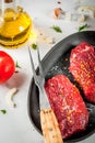 Raw beef steaks with vegetables Royalty Free Stock Photo