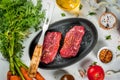 Raw beef steaks with vegetables Royalty Free Stock Photo