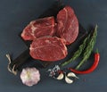 Raw beef steaks on wooden Board