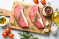 Raw beef striploin steak. Royalty Free Stock Photo