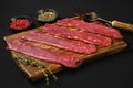 Raw beef strips on black background Royalty Free Stock Photo