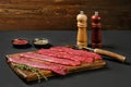 Raw beef strips on cutting board Royalty Free Stock Photo