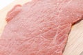 Raw beef top side on wooden board Royalty Free Stock Photo