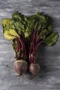 Raw beetroots on a rustic wooden table Royalty Free Stock Photo