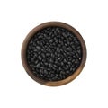 Raw black beans on a wooden bowl isolated over white background Royalty Free Stock Photo