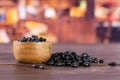 Raw black turtle beans with rustic kitchen Royalty Free Stock Photo