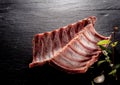Raw Boar Spare Ribs with Fresh Herbs Royalty Free Stock Photo