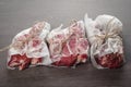 Raw Bone-in Rib eye Steak on wooden background