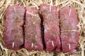 Raw braising steak in straw Royalty Free Stock Photo