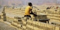 Raw bricks are ready for final process.A Bangladeshi worker collects raw bricks on a van Royalty Free Stock Photo