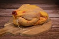 Raw broiler chicken meat, Fresh diet poultry meat on a brown background, Preparing a meat product