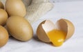 Raw broken chicken egg , egg yolk in shell Royalty Free Stock Photo
