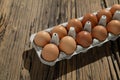 Raw brown chicken eggs box Royalty Free Stock Photo