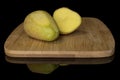 Raw brown potato isolated on black glass Royalty Free Stock Photo