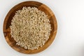 Raw brown rice in the wooden bowl Royalty Free Stock Photo