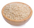 Raw brown rice in a wooden bowl isolated Royalty Free Stock Photo