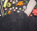 Raw buckwheat noodles, pickled ginger, onion, chopped pepper, chopsticks, soy sauce, ingredients cooking Asian food border ,pl Royalty Free Stock Photo