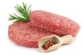 Raw burgers, rosemary and pepper Royalty Free Stock Photo