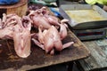 Kolkata, India 27-Aug-2020 : Raw butchered chicken in queue in Indian market kept in wooden board with weighing machine
