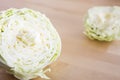 Raw cabbage sliced on wood table Royalty Free Stock Photo