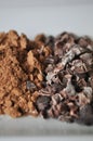 Raw cacao powder and crushed cocoa beans Royalty Free Stock Photo