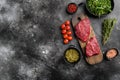 Raw cap rump steak, on black dark stone table background, top view flat lay, with copy space for text Royalty Free Stock Photo