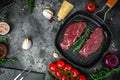 Raw cap rump steak or top sirloin beef meat steak oon a grill pan on black background. top view Royalty Free Stock Photo