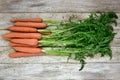 Raw carrots on a rustic white table Royalty Free Stock Photo