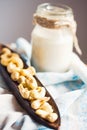 Raw cashew nuts in a wooden platter