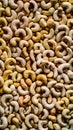 Raw Cashews Large Quantity on Smooth Surface