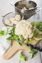Raw cauliflower on the table of the kitchen
