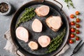 Raw caw bones butcher cut, on gray stone table background, top view flat lay Royalty Free Stock Photo