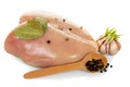 Raw chicken breast, garlic and black pepper in spoon isolated Royalty Free Stock Photo