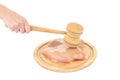 Raw chicken breast and mallet on wooden board. Royalty Free Stock Photo