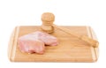 Raw chicken breast and mallet Royalty Free Stock Photo