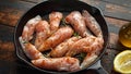 Raw chicken breast mini fillets in rastic cast iron skillet, frying pan with herbs and sea salt Royalty Free Stock Photo