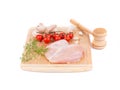 Raw chicken breast with tomatoes and mushrooms. Royalty Free Stock Photo