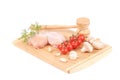 Raw chicken breast and vegetables with meat mallet Royalty Free Stock Photo