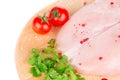 Raw chicken breast on wooden platter. Royalty Free Stock Photo