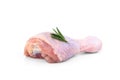 Raw chicken leg with rosemary isolated on white background. Royalty Free Stock Photo