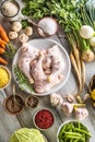 Raw chicken legs with assortment spices and vegetables Royalty Free Stock Photo